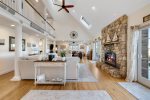 Vaulted ceilings and skylights add to the expansive feel of the room